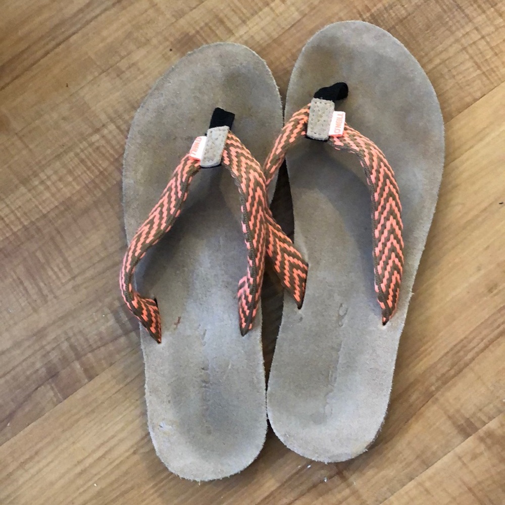 Sandals with brown and orange stripes